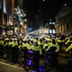 Philadelphia police officers try to keep fans away from City Hall as fans celebrate the Philadelphia Eagles’ victory in Super Bowl LII against the New England Patriots in the early morning hours of Feb. 5, 2018, in Philadelphia. (Eduardo Munoz Alvarez/Getty Images)